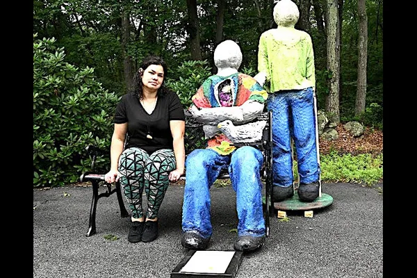Here is the art? It’s a piece called ‘I Am Here.’